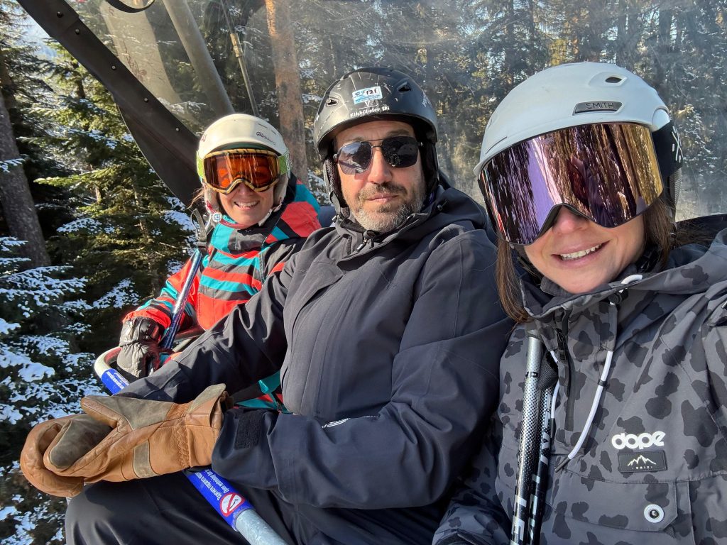 Friends on a chairlift in Bansko ski resort